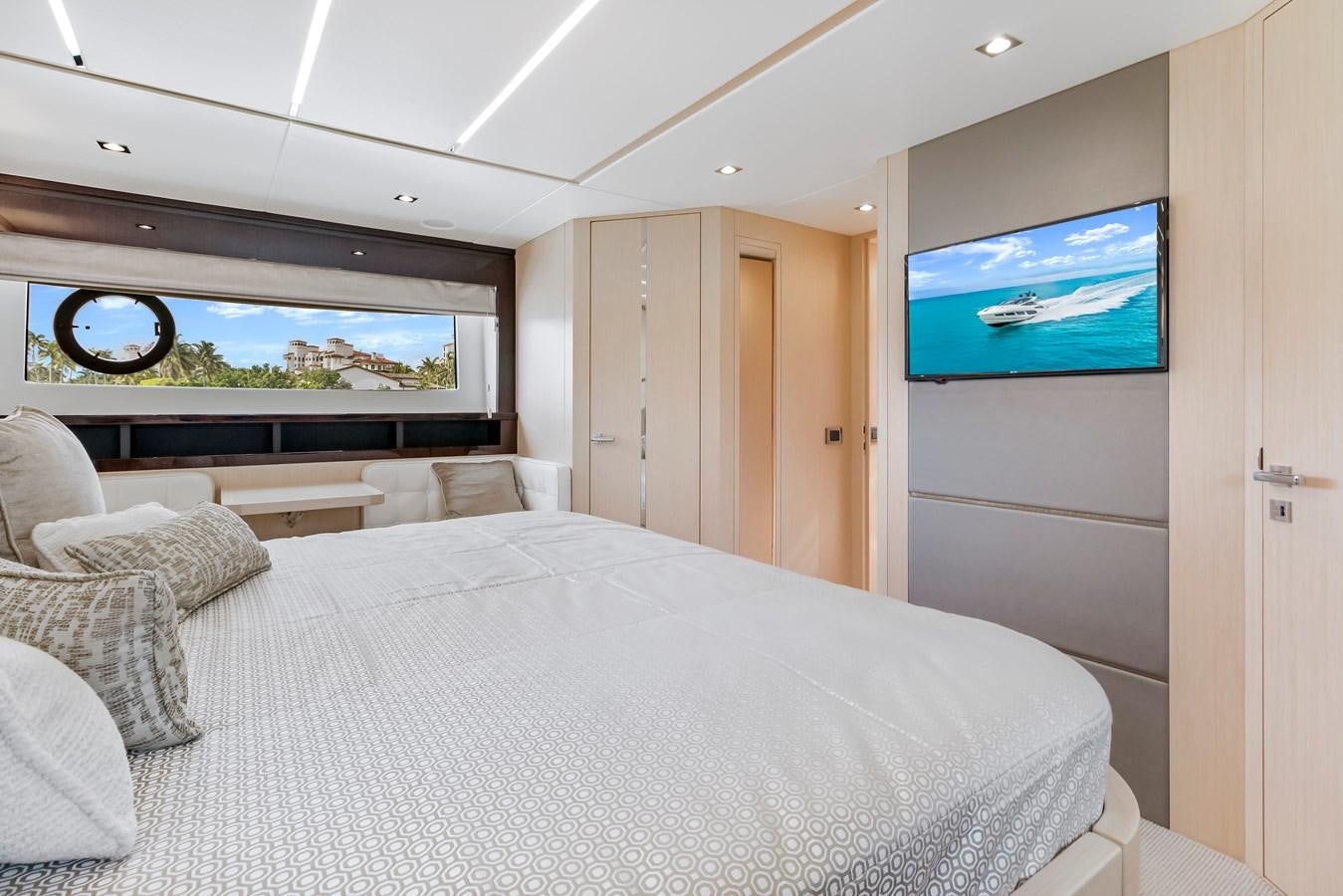a large bed in a room aboard SUNSEEKER PREDATOR Yacht for Sale