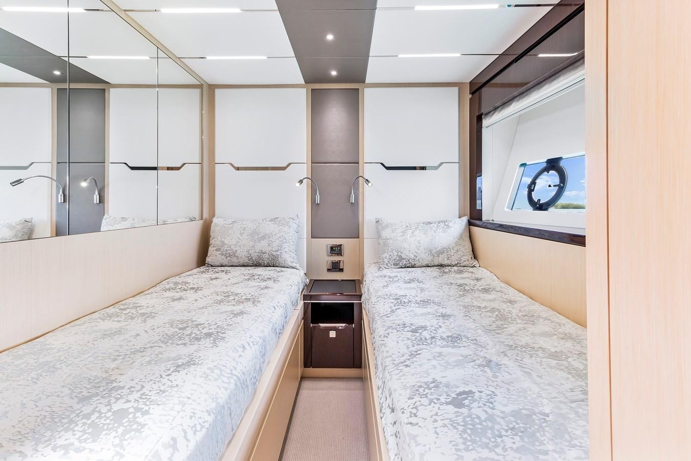 a room with two beds aboard SUNSEEKER PREDATOR Yacht for Sale