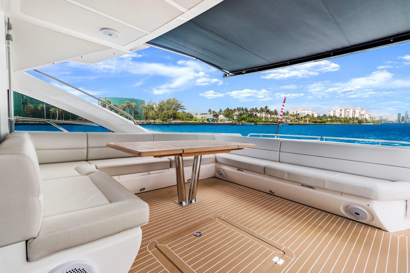 a room with a table and chairs aboard SUNSEEKER PREDATOR Yacht for Sale
