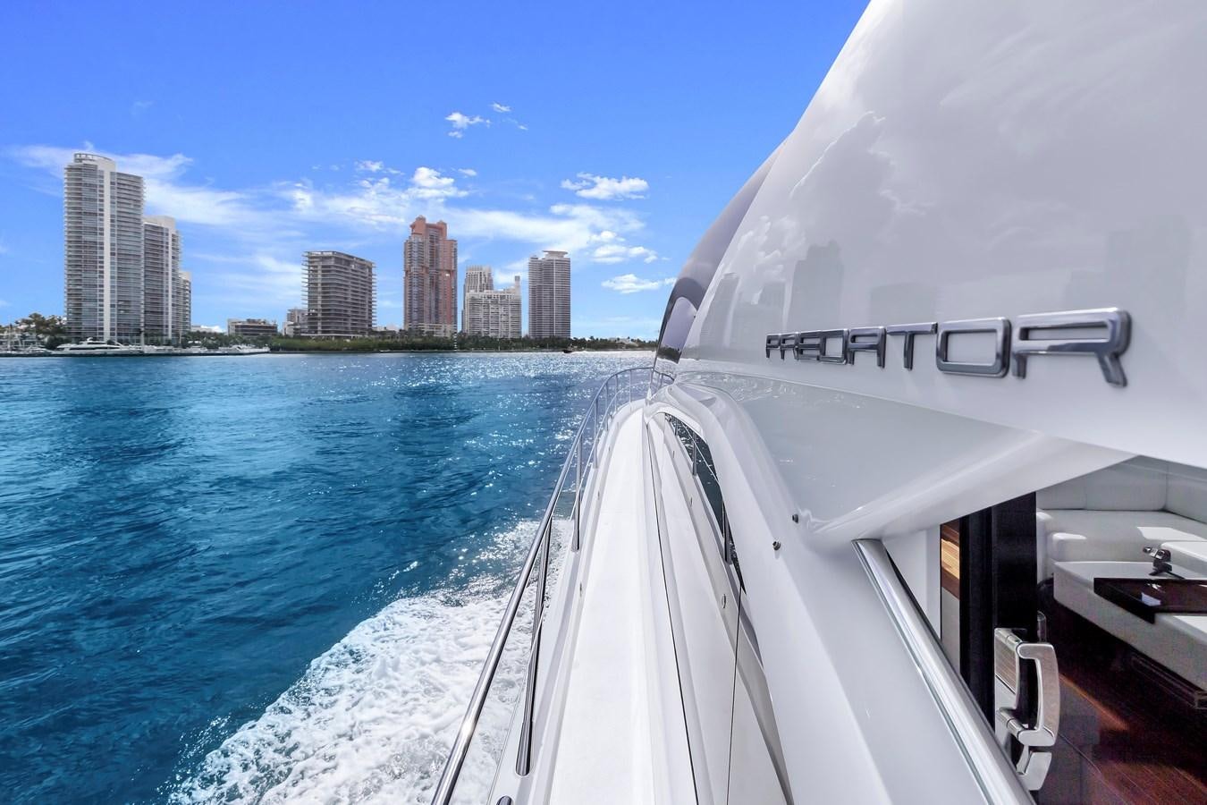 a boat on the water aboard SUNSEEKER PREDATOR Yacht for Sale