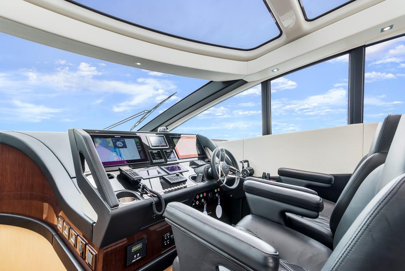 inside of a car aboard SUNSEEKER PREDATOR Yacht for Sale