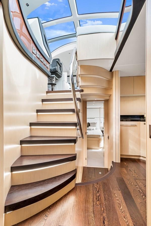 a staircase with a glass door aboard SUNSEEKER PREDATOR Yacht for Sale