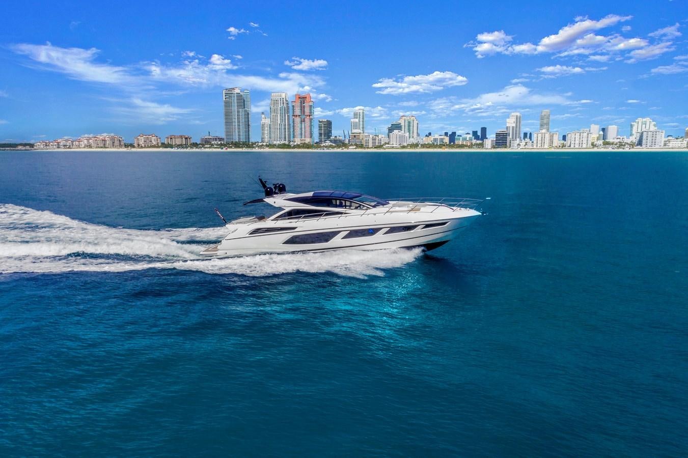 a boat on the water aboard SUNSEEKER PREDATOR Yacht for Sale