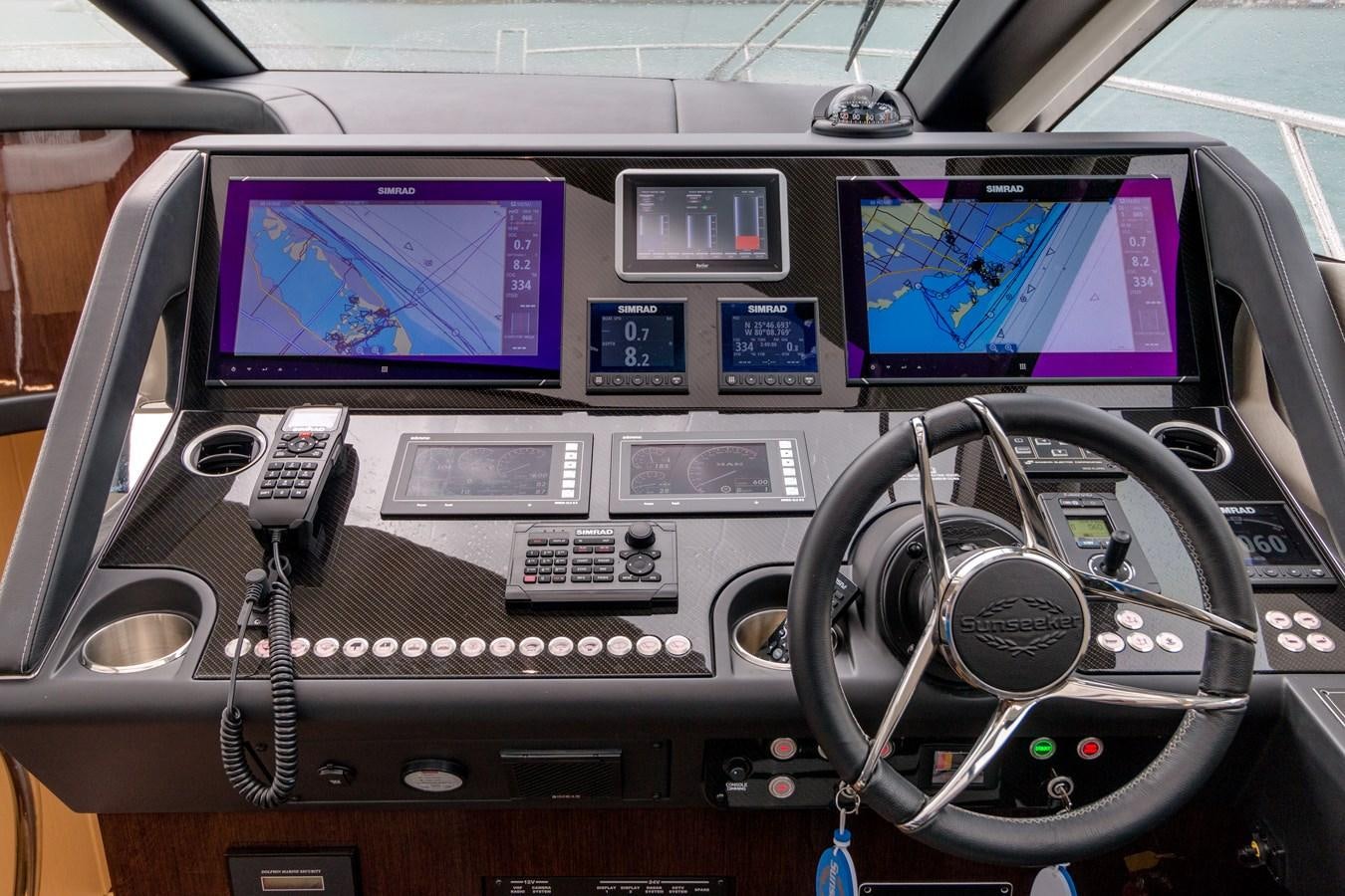 inside of a car aboard SUNSEEKER PREDATOR Yacht for Sale