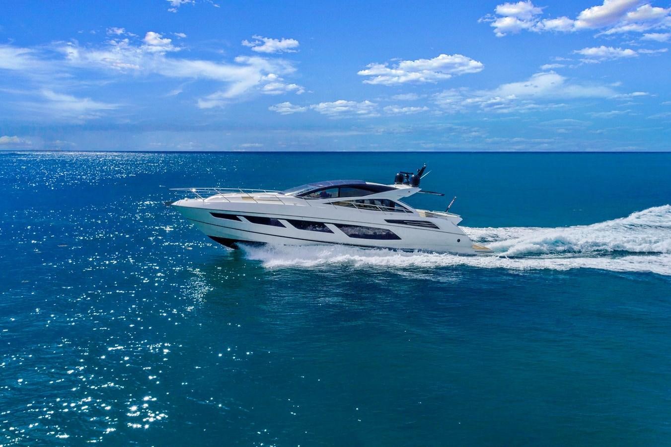 a white boat in the water aboard SUNSEEKER PREDATOR Yacht for Sale