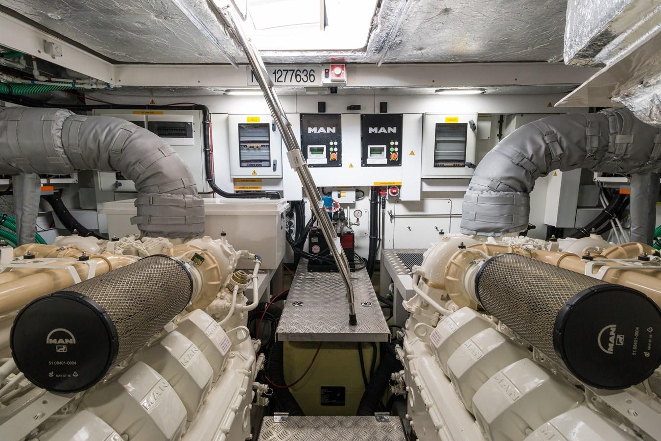 a machine with a large pipe aboard SUNSEEKER PREDATOR Yacht for Sale