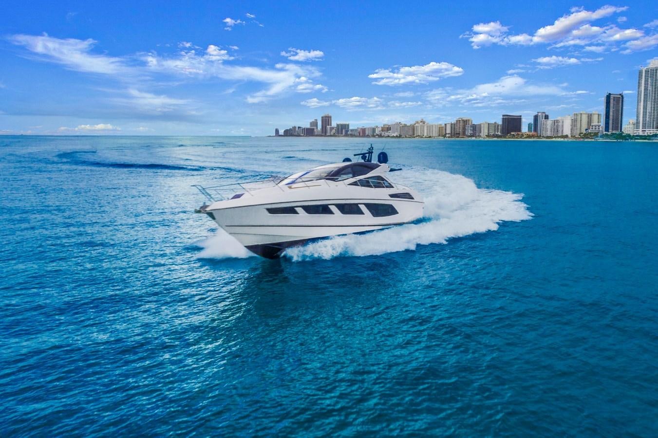 a white yacht in the water aboard SUNSEEKER PREDATOR Yacht for Sale