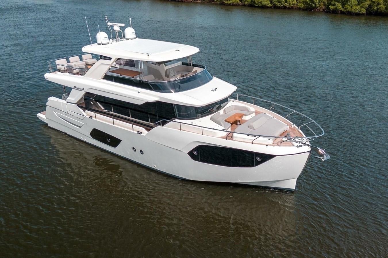 a couple of white boats on water aboard NAVETTA 68 Yacht for Sale