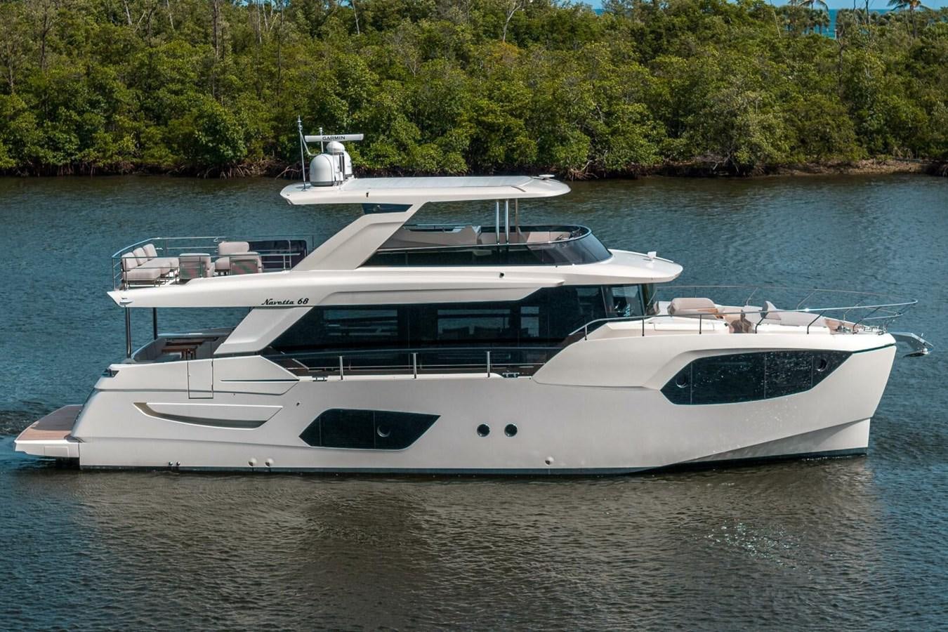 a white yacht on the water aboard NAVETTA 68 Yacht for Sale