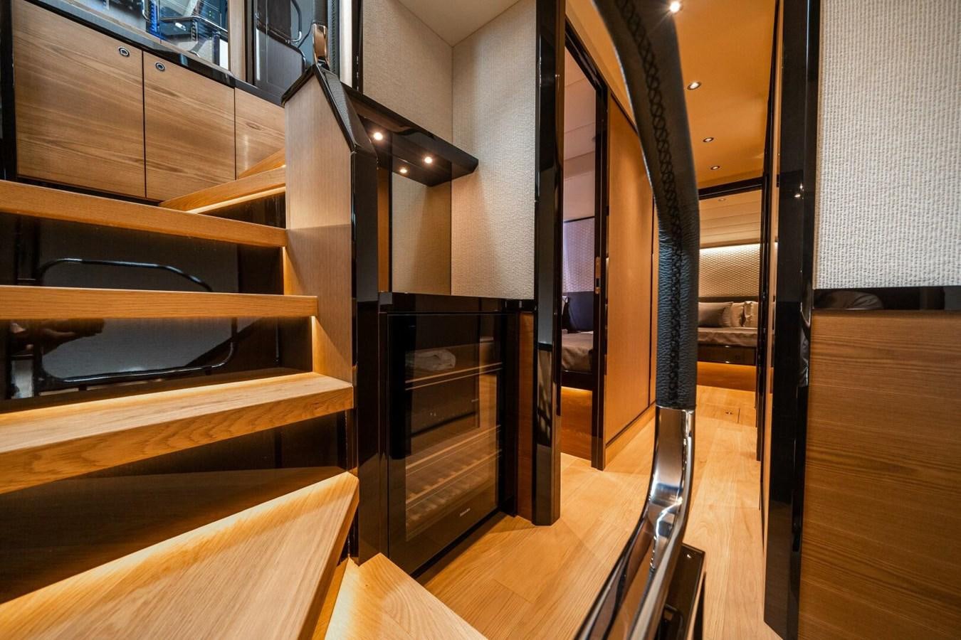 a kitchen with wooden floors aboard NAVETTA 68 Yacht for Sale