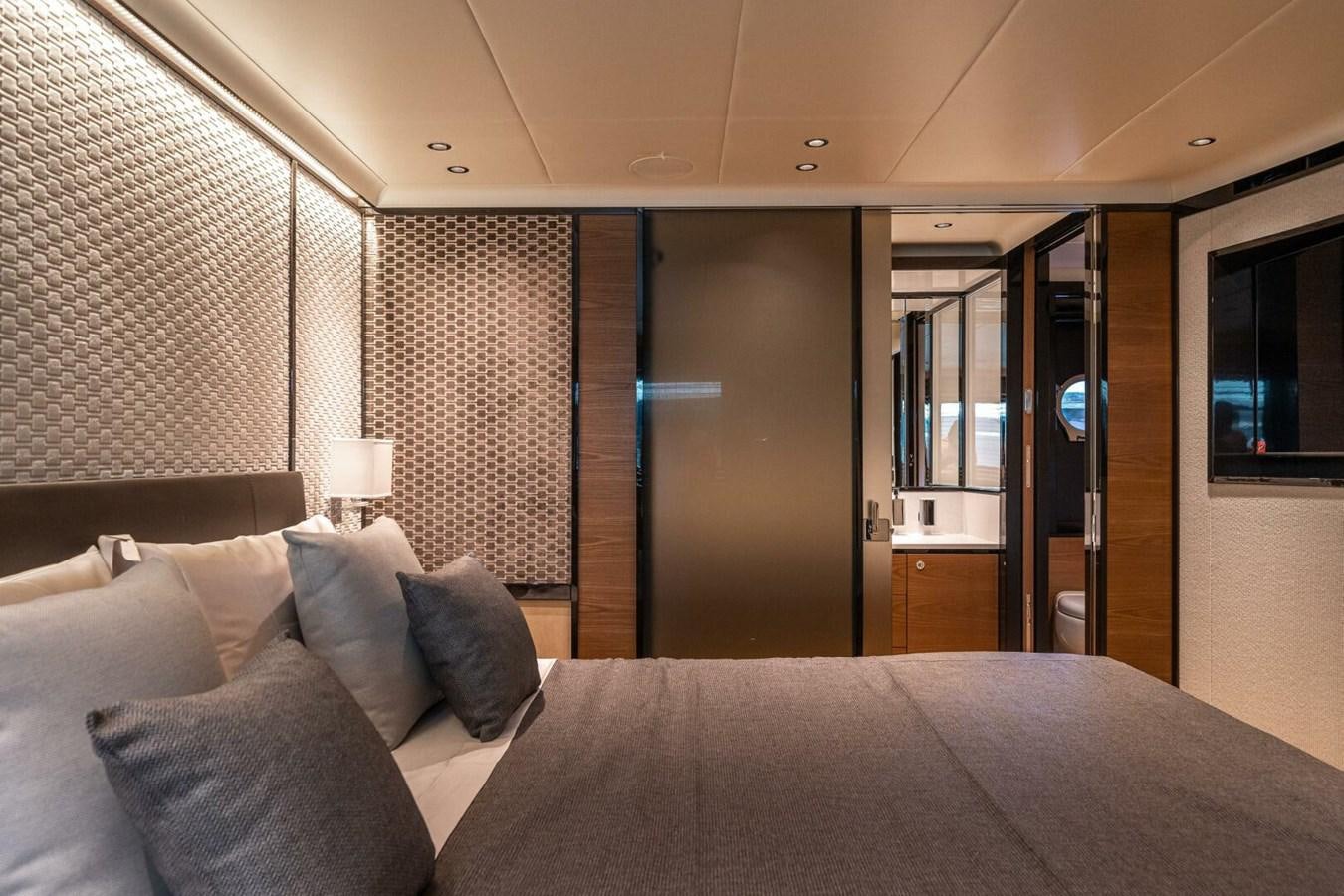 a large bed in a room aboard NAVETTA 68 Yacht for Sale
