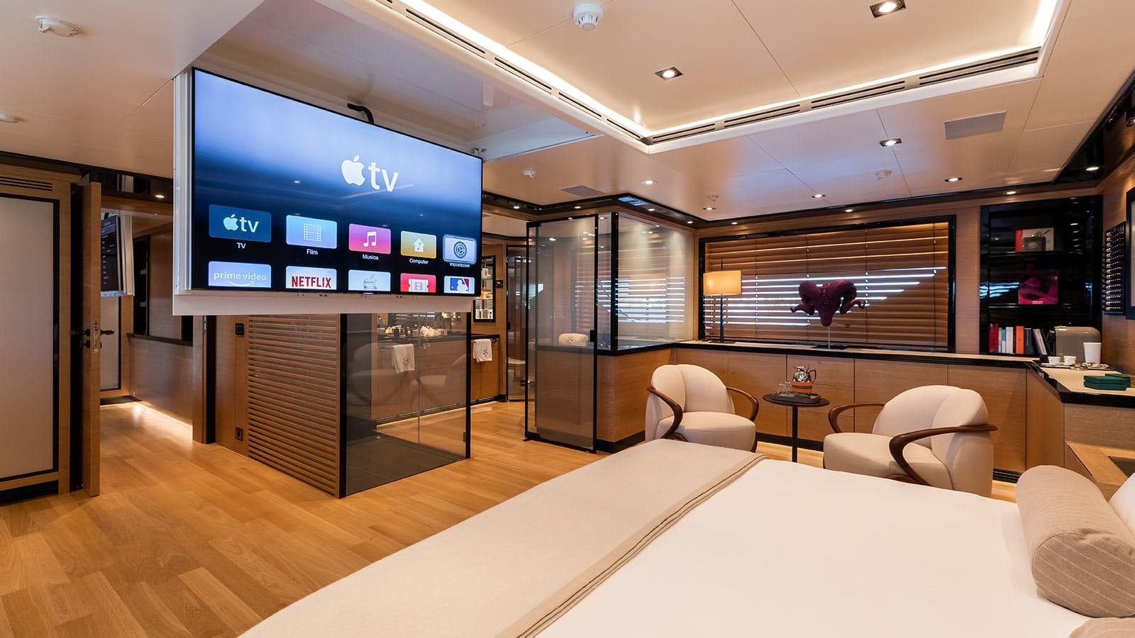 a room with a large tv aboard ALASKA Yacht for Sale
