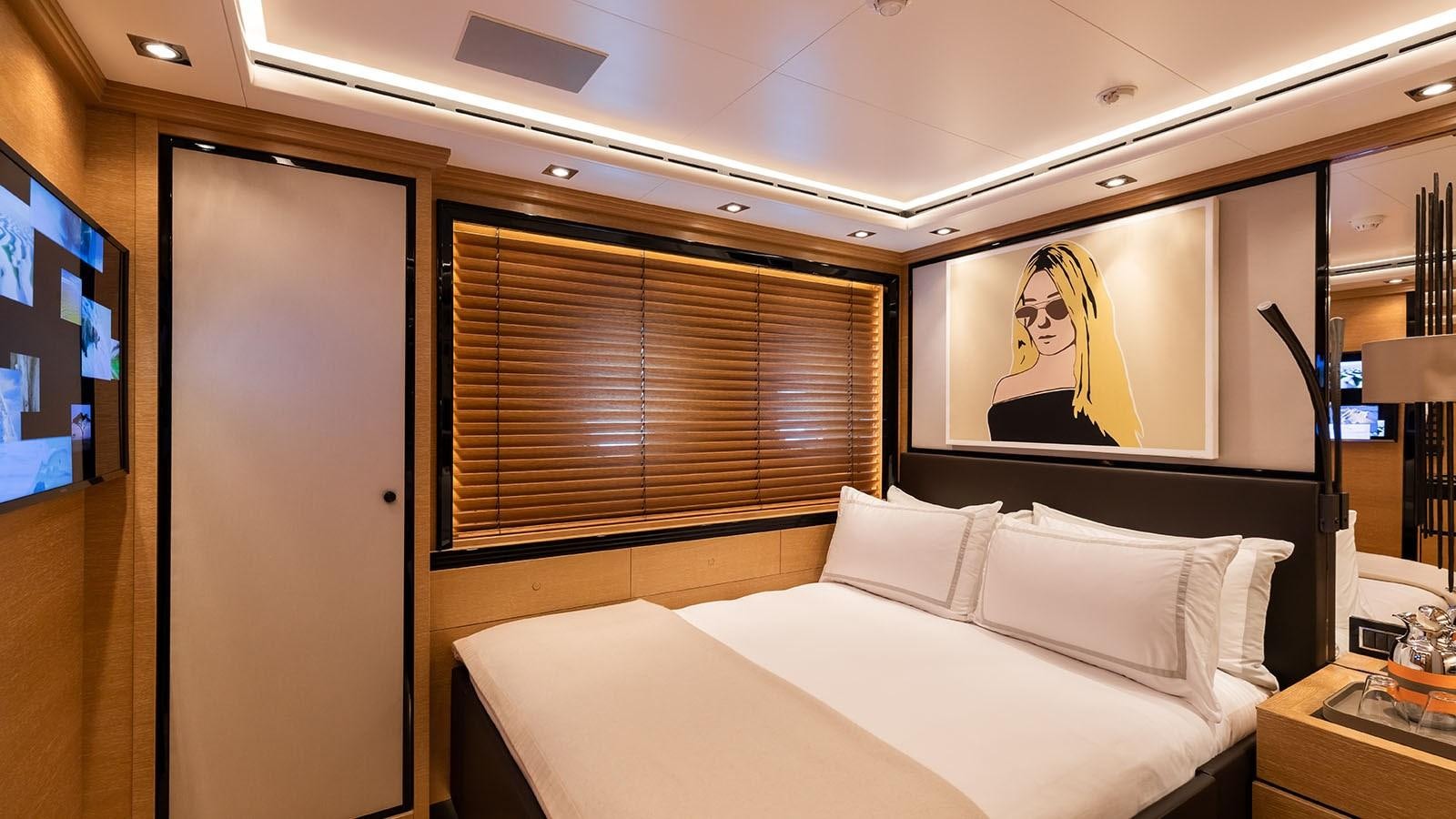 a hotel room with a large mirror aboard ALASKA Yacht for Sale