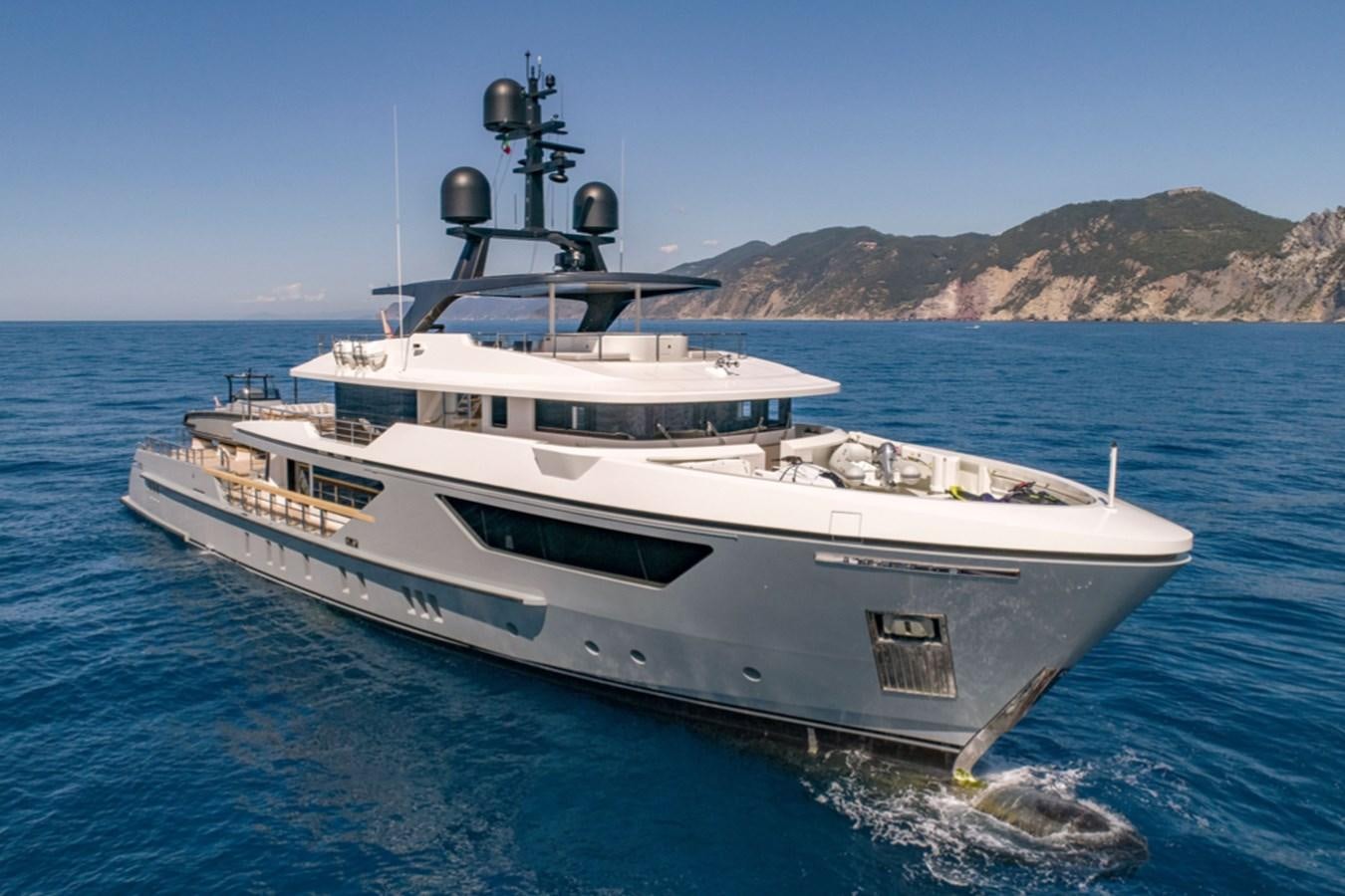 a white boat in the water aboard MYKO Yacht for Sale