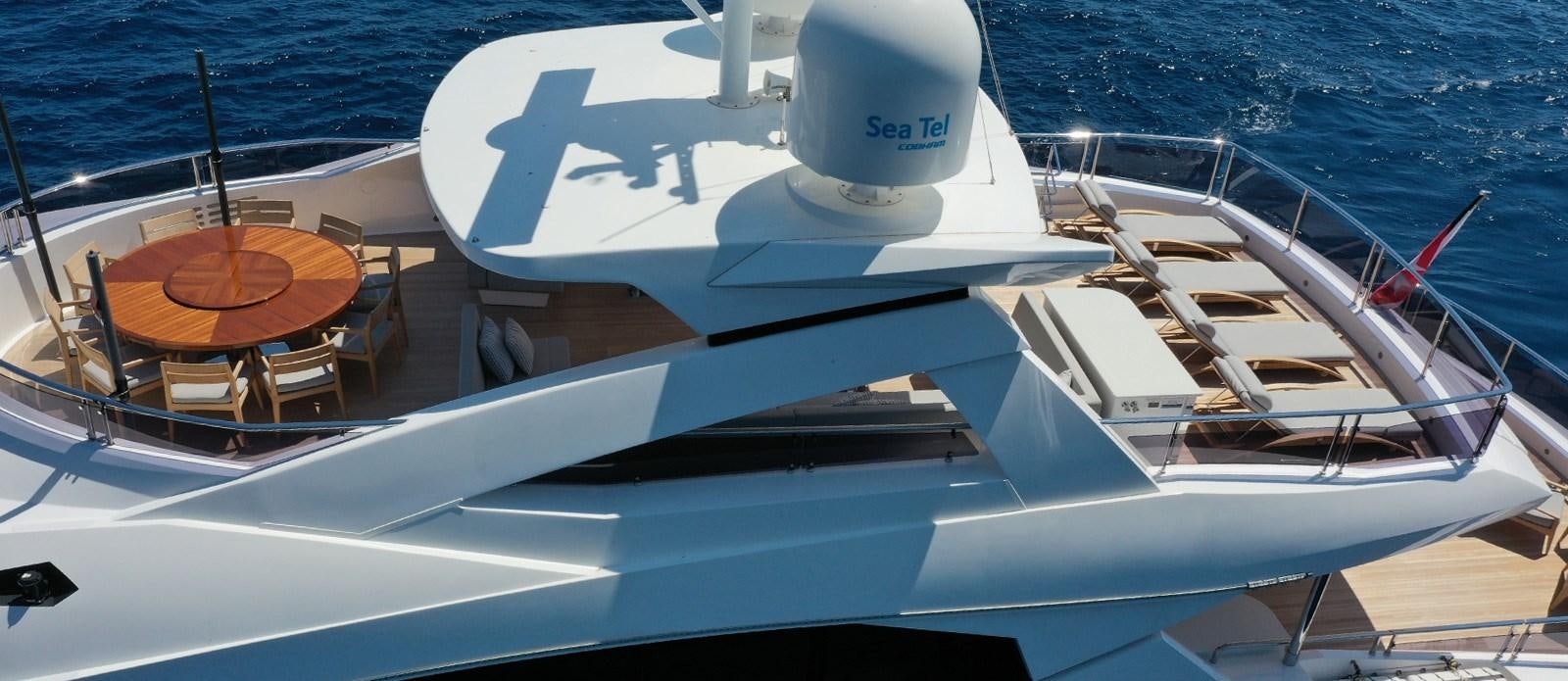 a white boat on the water aboard ALADDIN Yacht for Sale