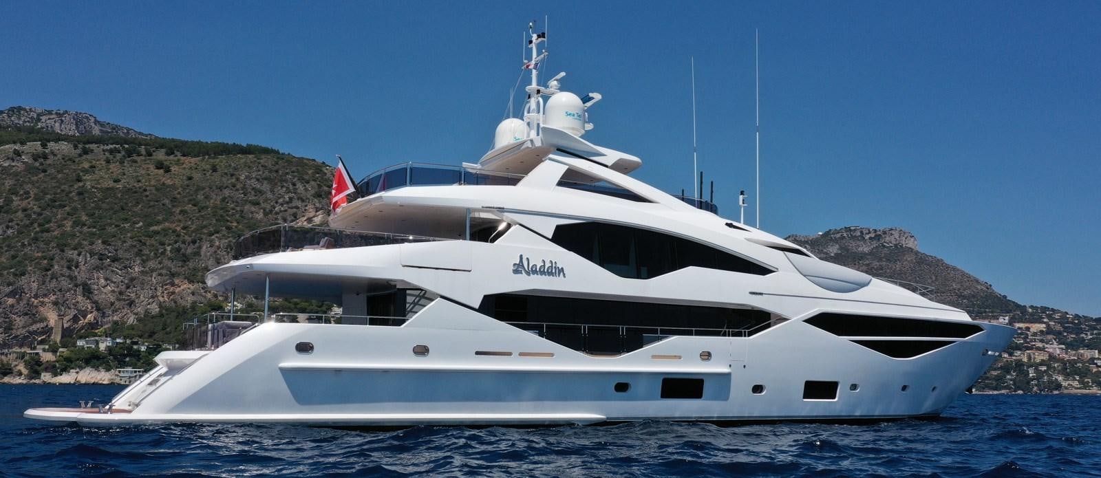 a white yacht on the water aboard ALADDIN Yacht for Sale