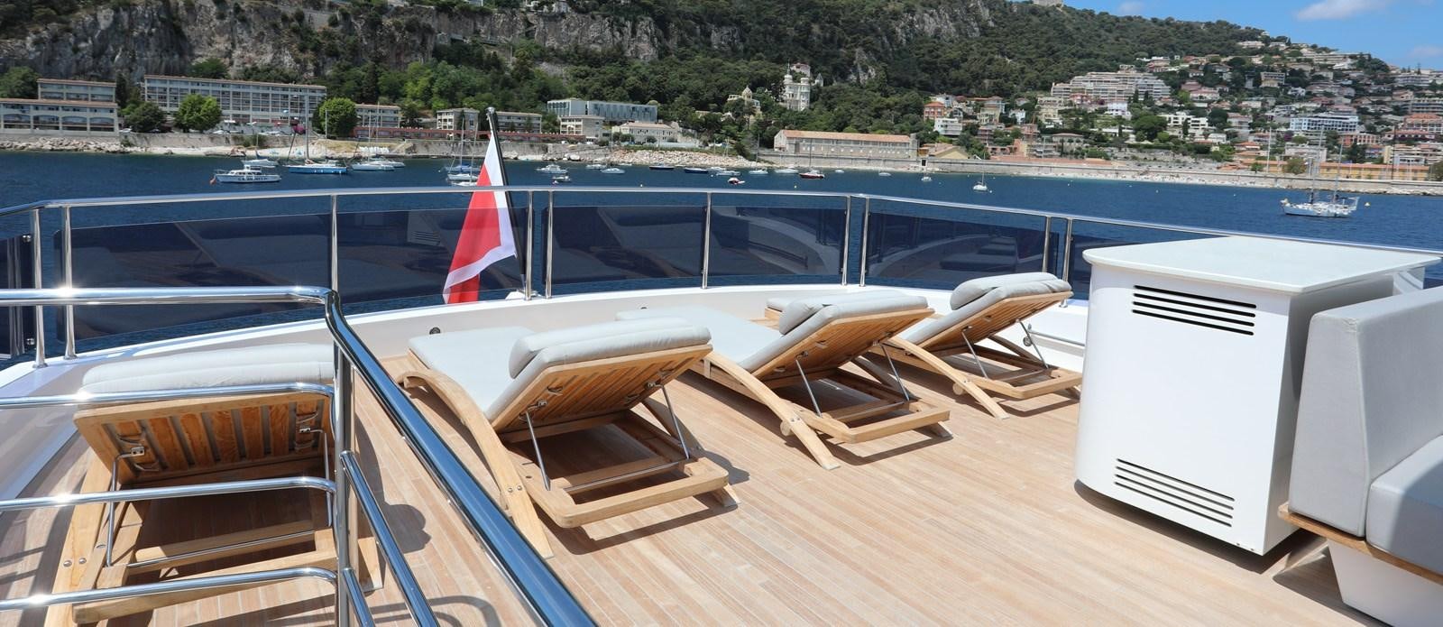 a boat on a deck aboard ALADDIN Yacht for Sale