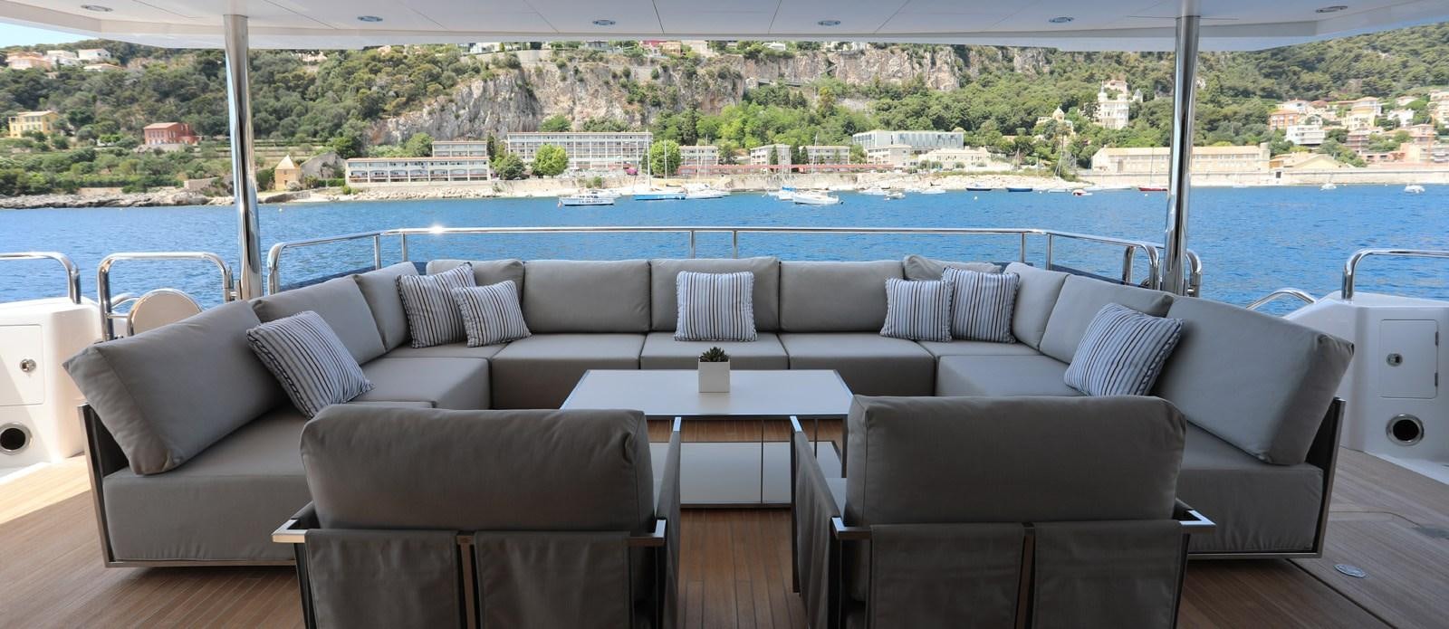 a living room with a large window aboard ALADDIN Yacht for Sale