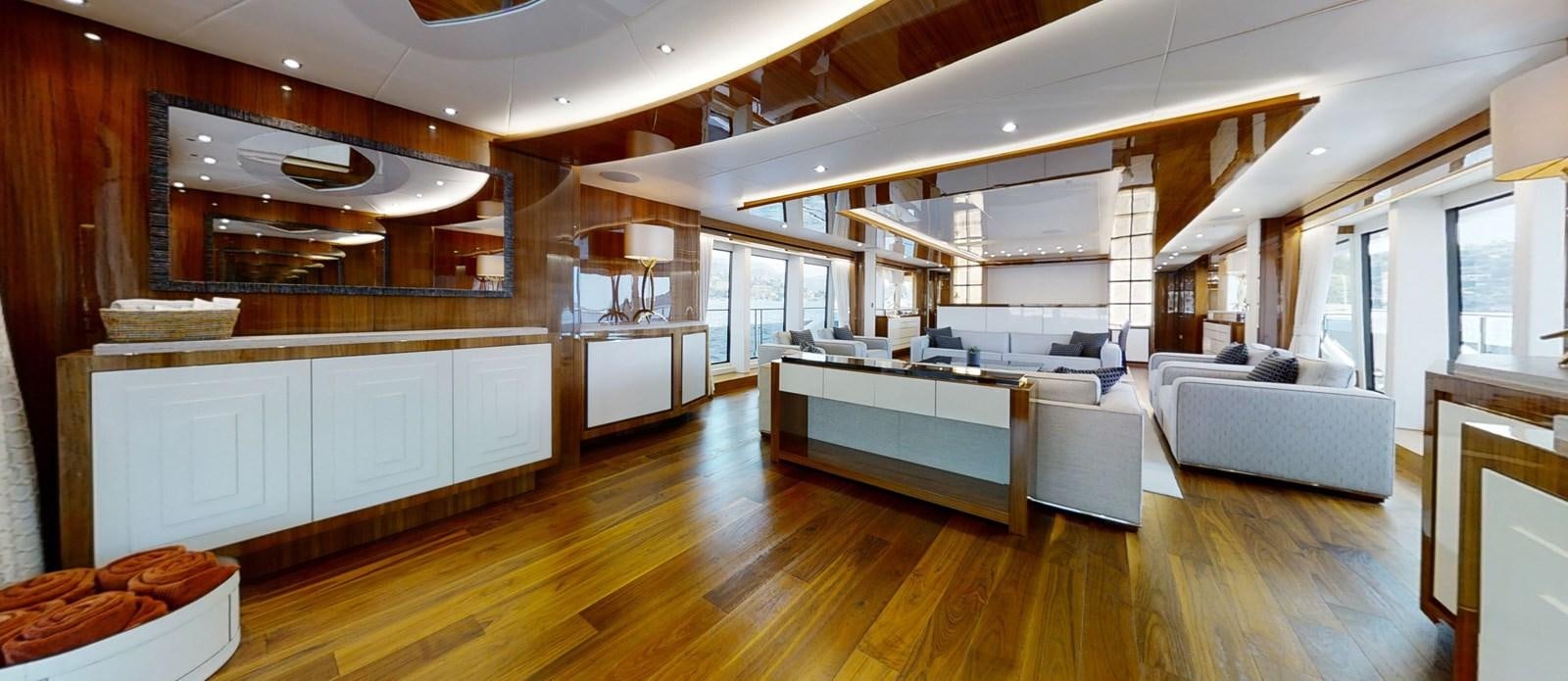 a large kitchen and living room aboard ALADDIN Yacht for Sale