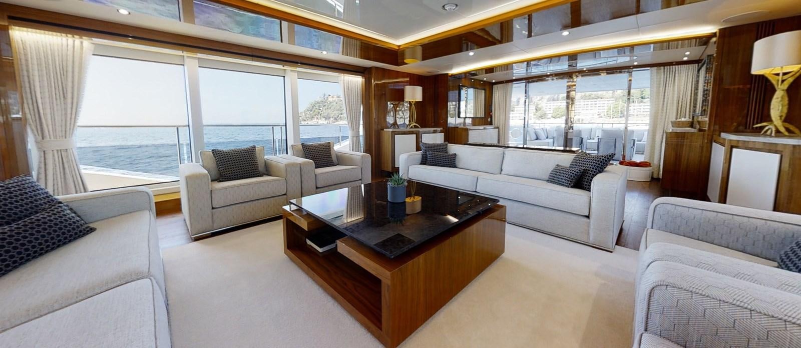a living room with a large window aboard ALADDIN Yacht for Sale