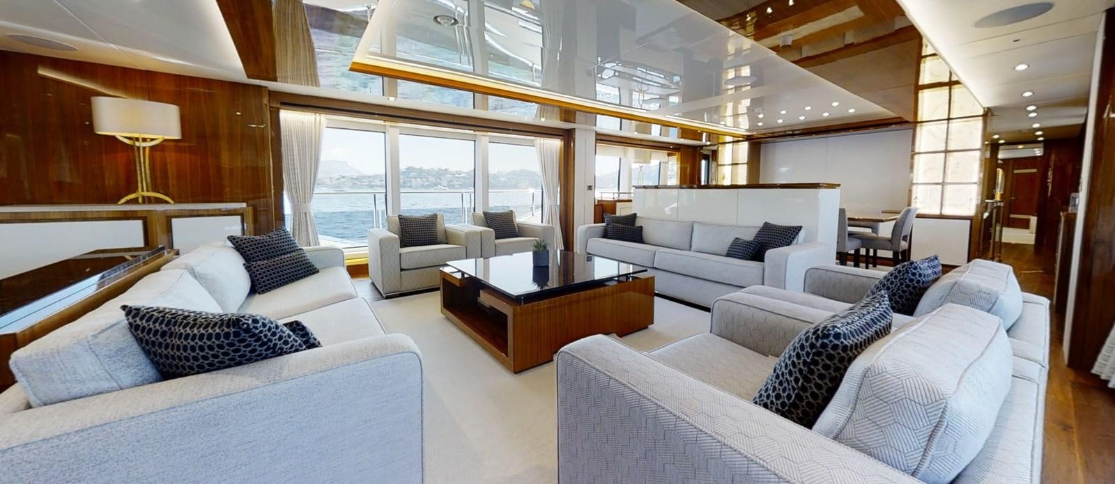 a living room with a large window aboard ALADDIN Yacht for Sale