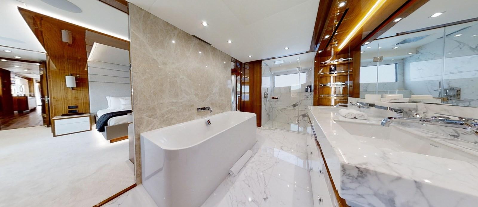 a large bathroom with a bathtub aboard ALADDIN Yacht for Sale