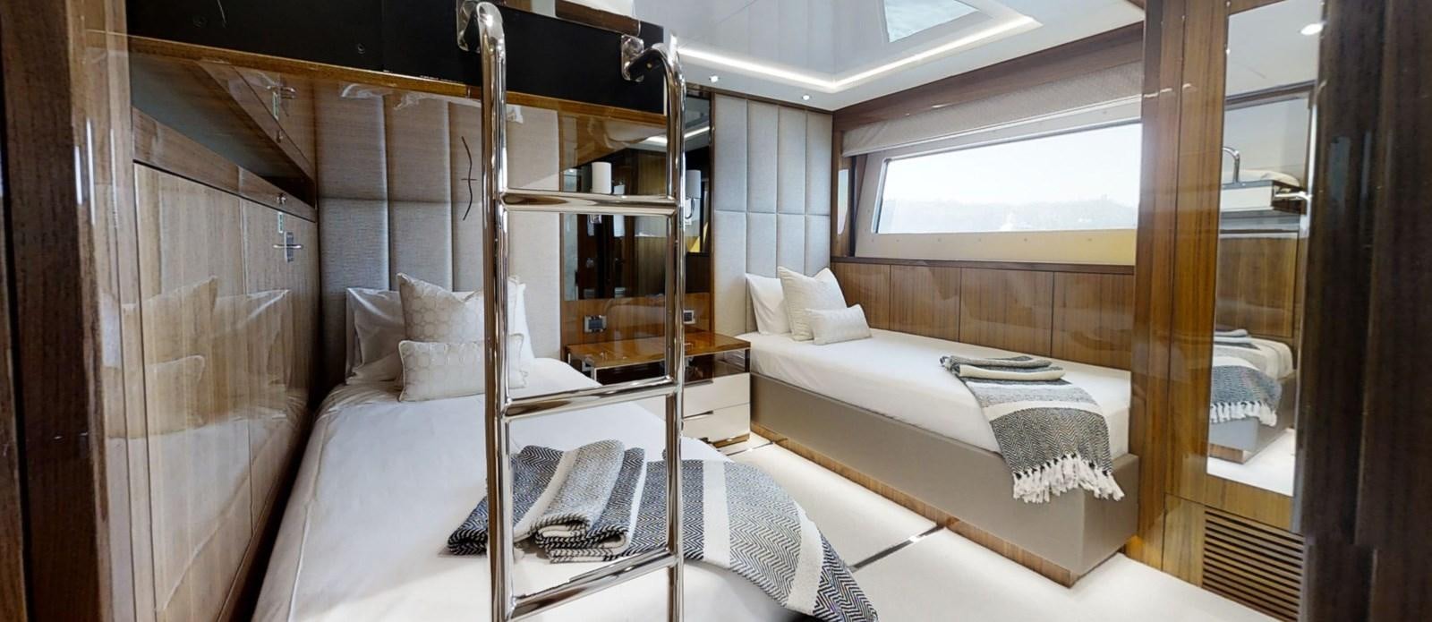 a room with two beds aboard ALADDIN Yacht for Sale