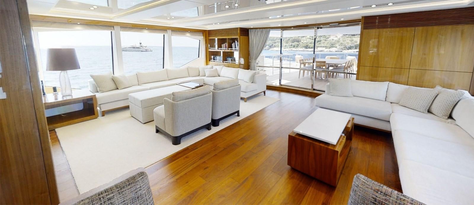 a living room with a large window aboard ALADDIN Yacht for Sale