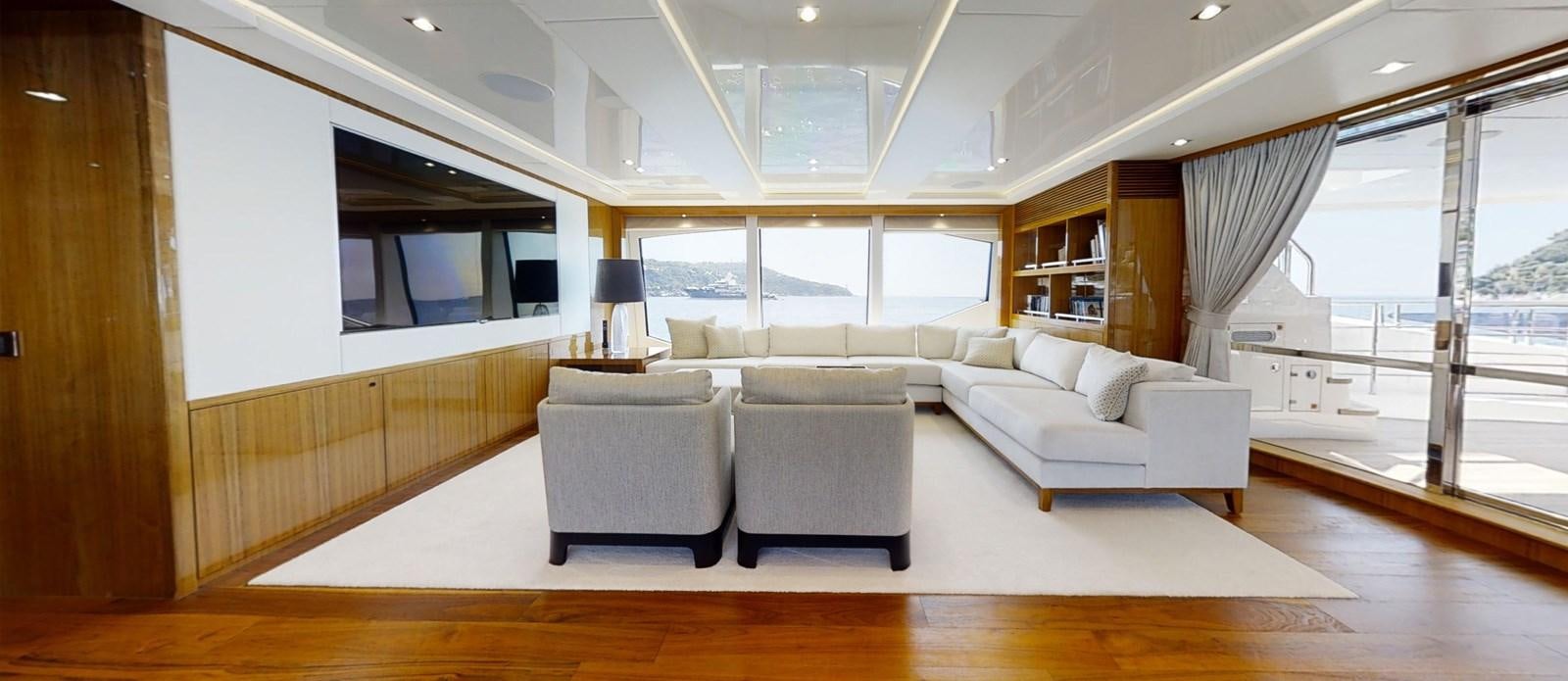 a living room with a large window aboard ALADDIN Yacht for Sale