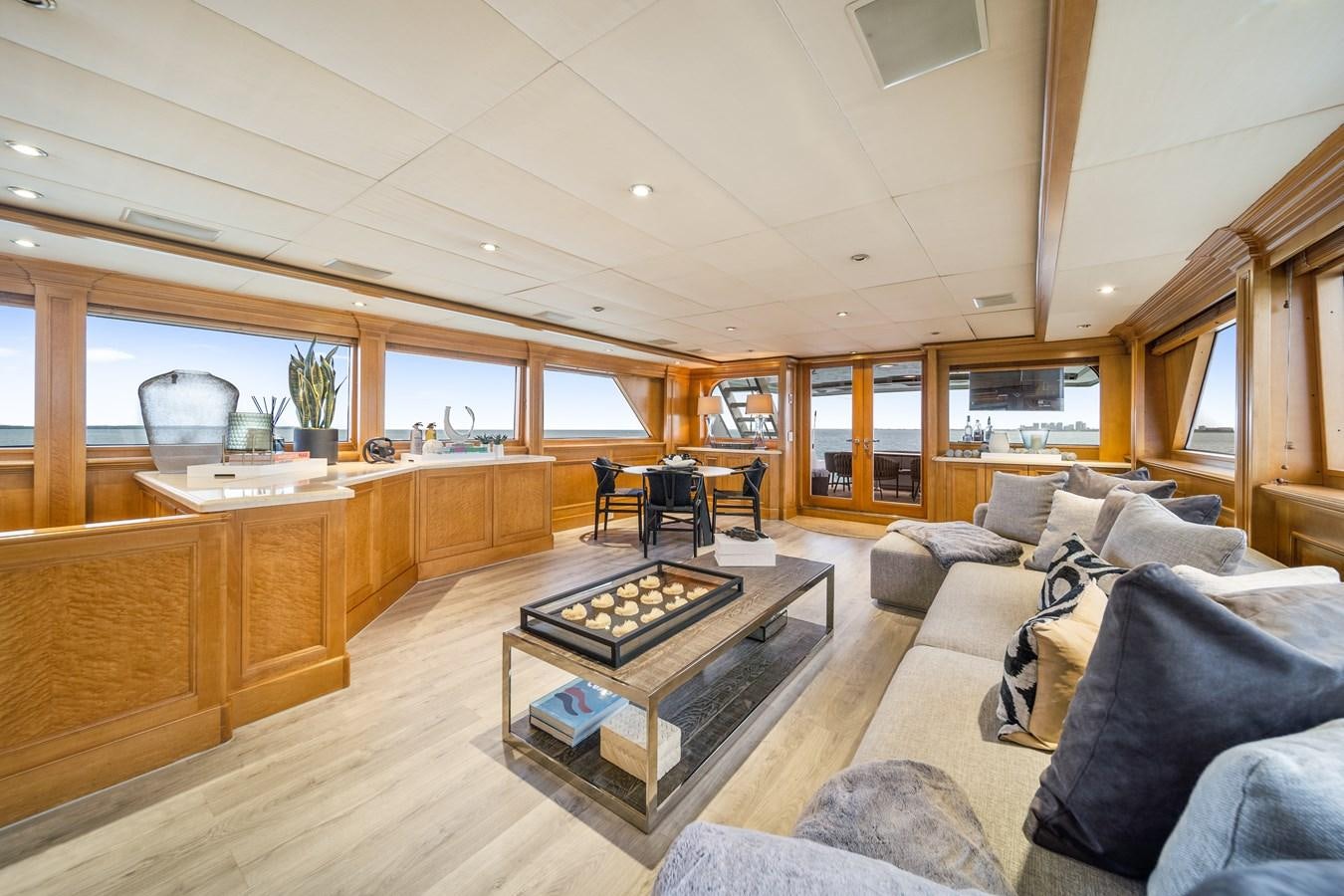 a living room with a couch and a coffee table aboard OCEAN DRIVE Yacht for Sale