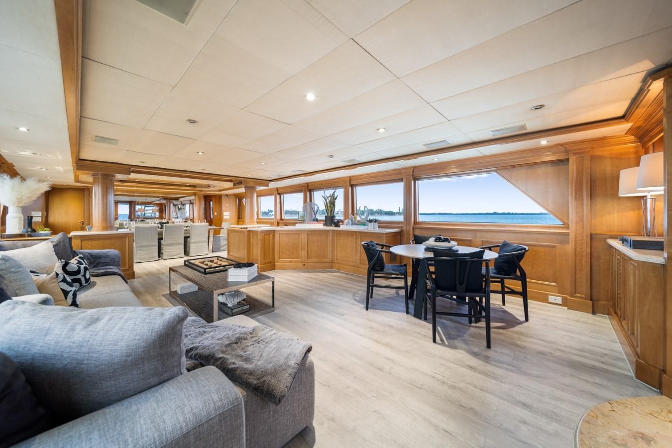 a living room with a large window aboard OCEAN DRIVE Yacht for Sale