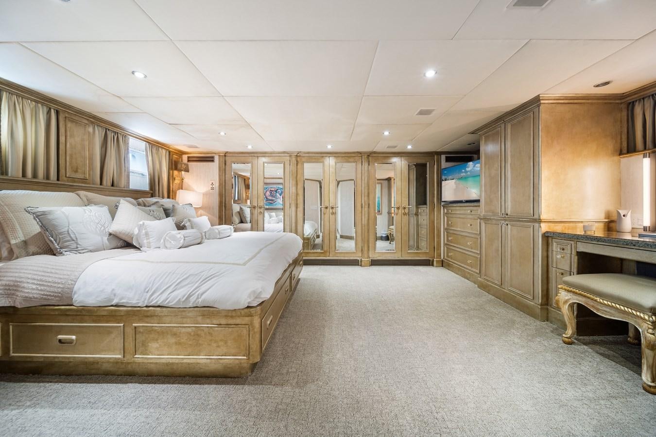 a large bedroom with a bed aboard OCEAN DRIVE Yacht for Sale