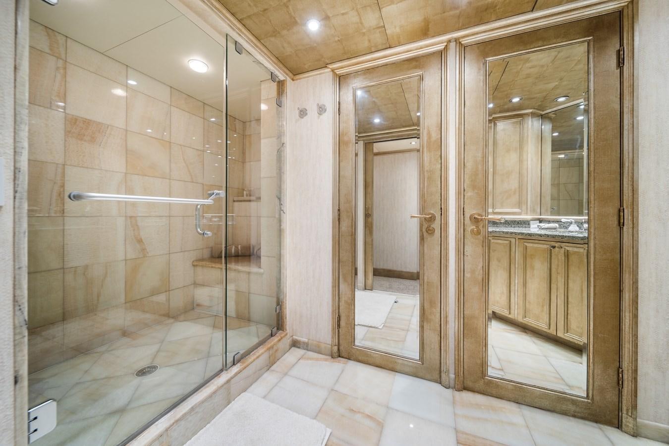 a bathroom with a glass shower aboard OCEAN DRIVE Yacht for Sale