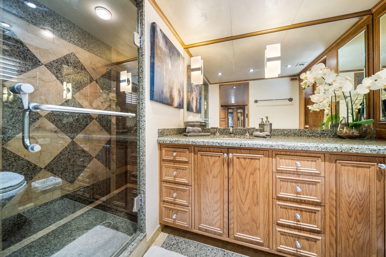 a bathroom with a marble counter top aboard OCEAN DRIVE Yacht for Sale