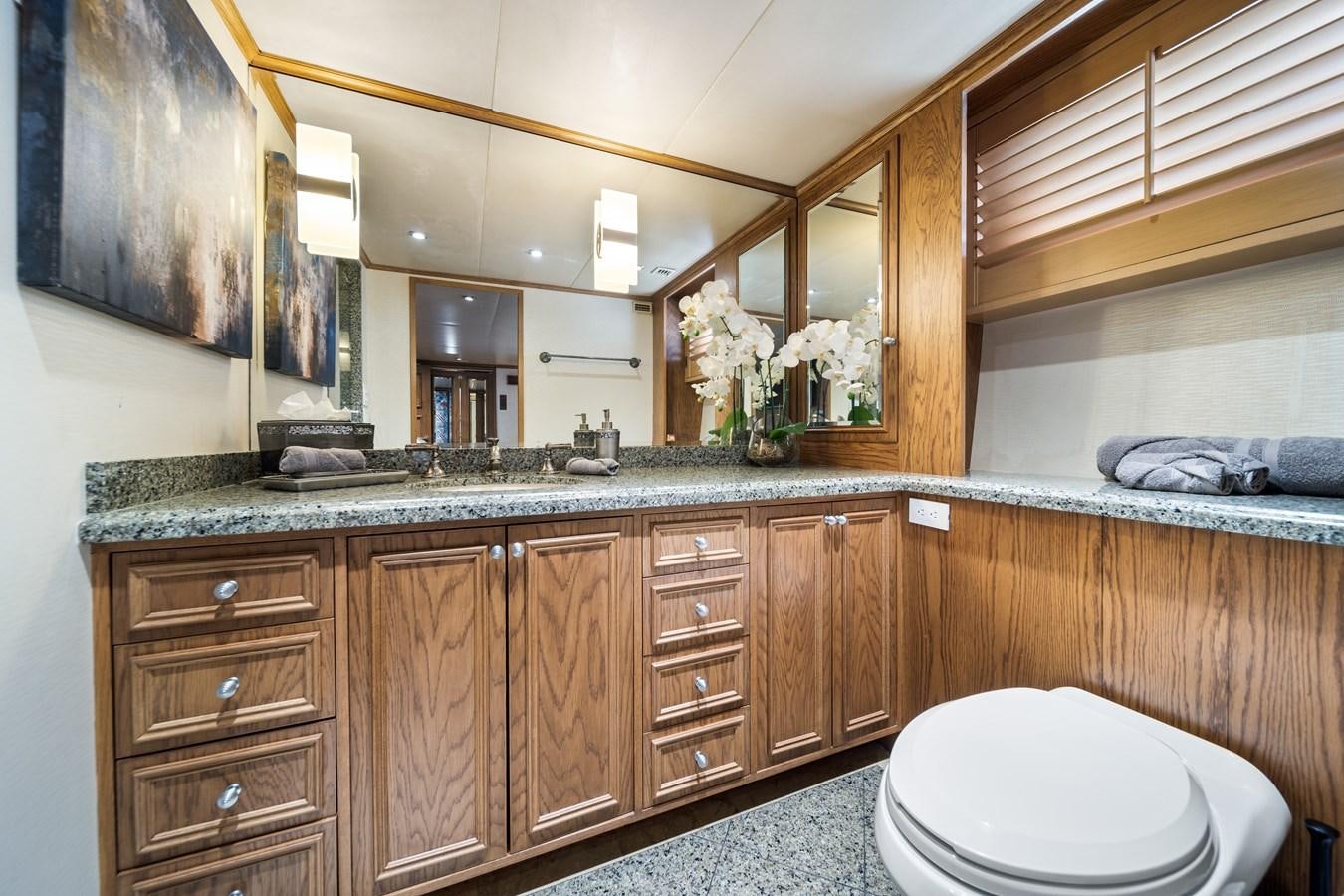a bathroom with a large mirror aboard OCEAN DRIVE Yacht for Sale