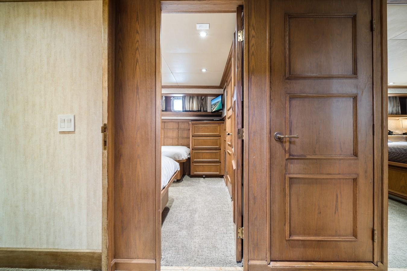 a room with wooden doors aboard OCEAN DRIVE Yacht for Sale