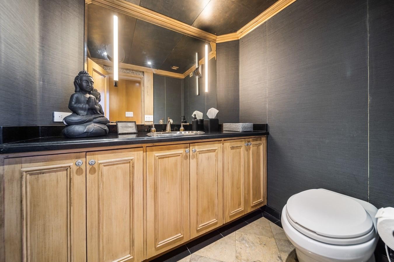 a bathroom with a large mirror aboard OCEAN DRIVE Yacht for Sale