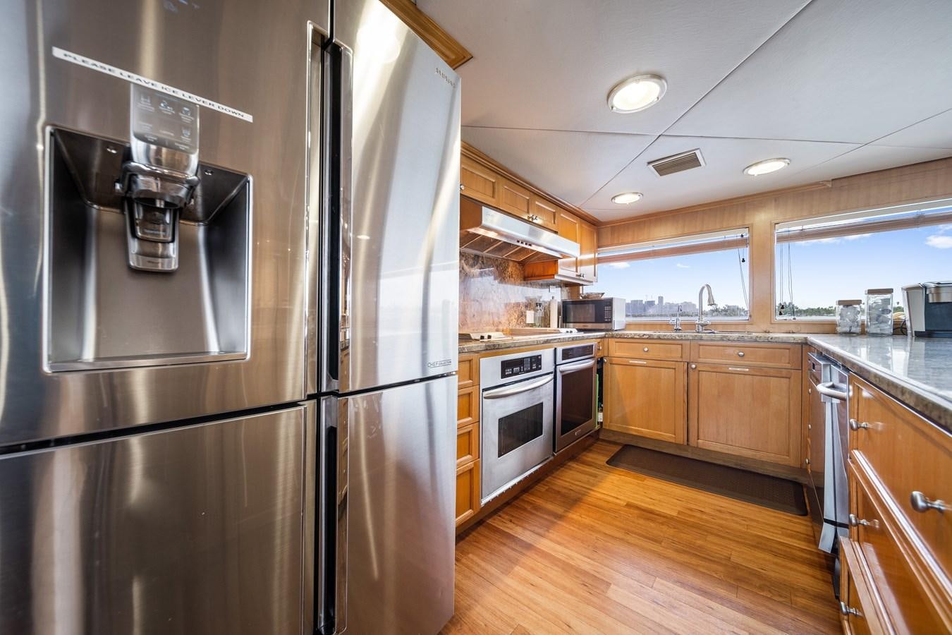 a kitchen with stainless steel appliances aboard OCEAN DRIVE Yacht for Sale
