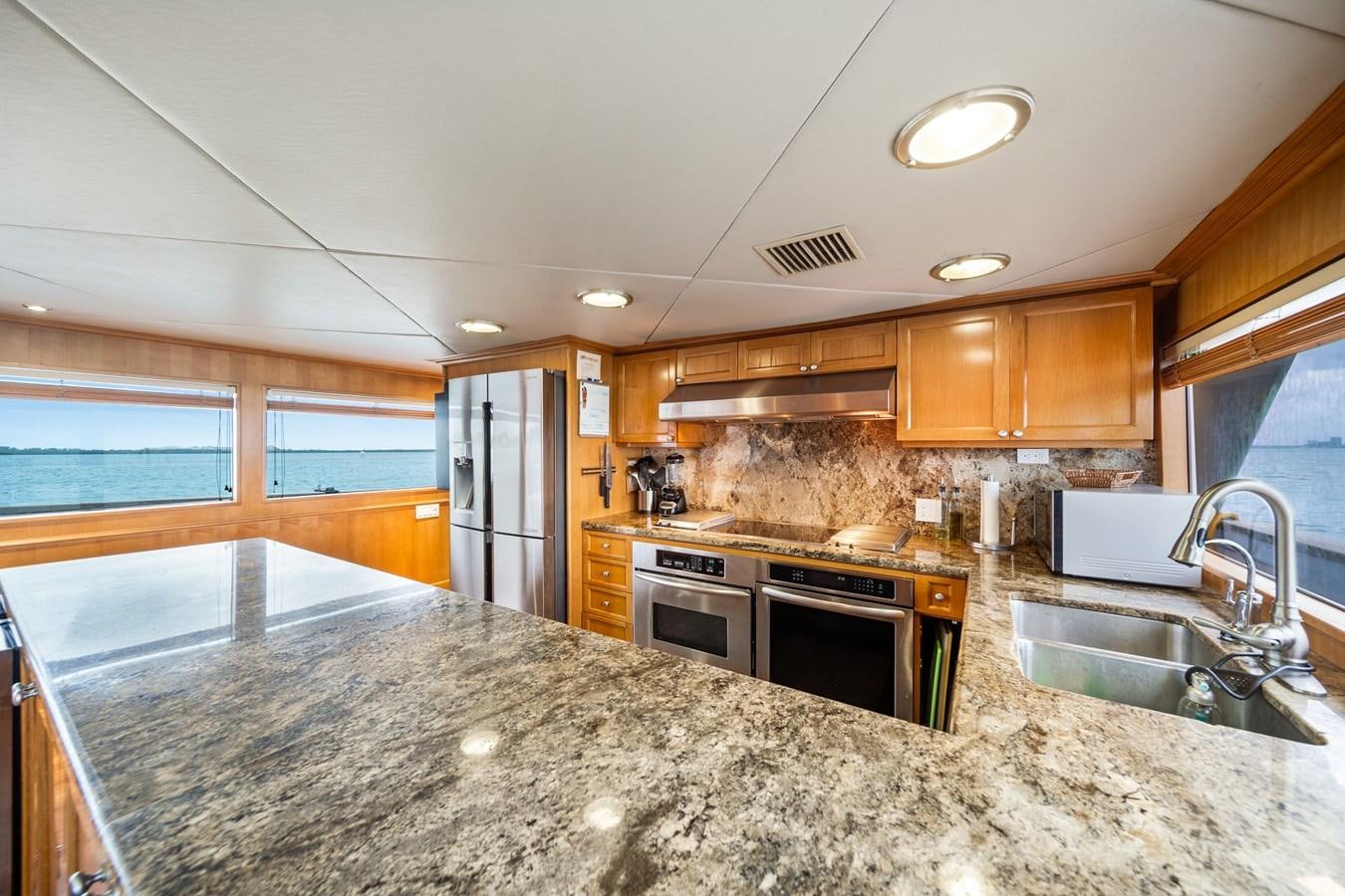 a kitchen with granite counter tops aboard OCEAN DRIVE Yacht for Sale