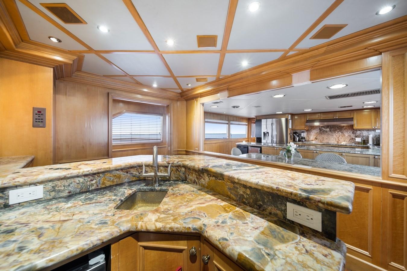 a kitchen with marble counters aboard OCEAN DRIVE Yacht for Sale