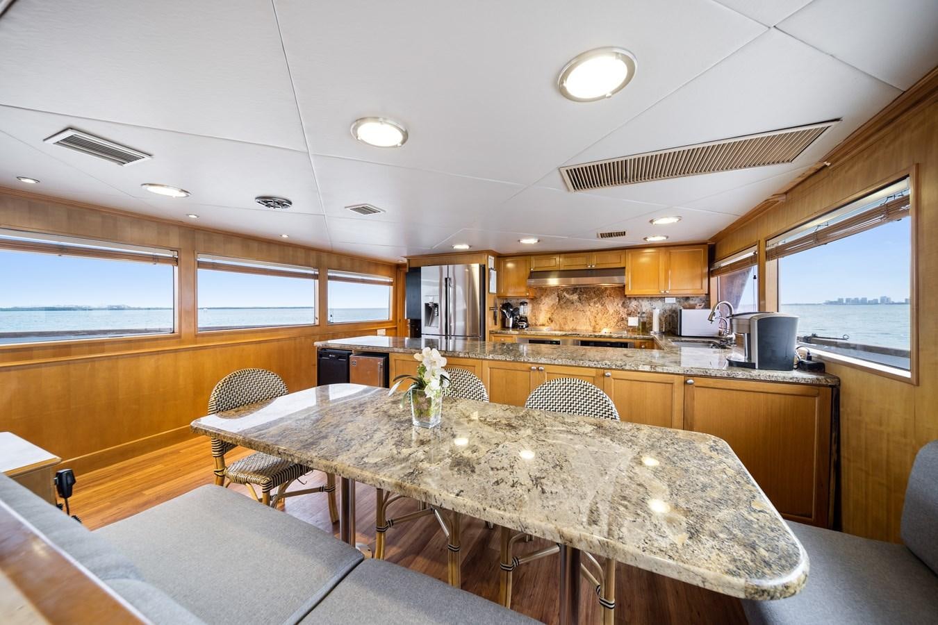 a kitchen with a large island aboard OCEAN DRIVE Yacht for Sale