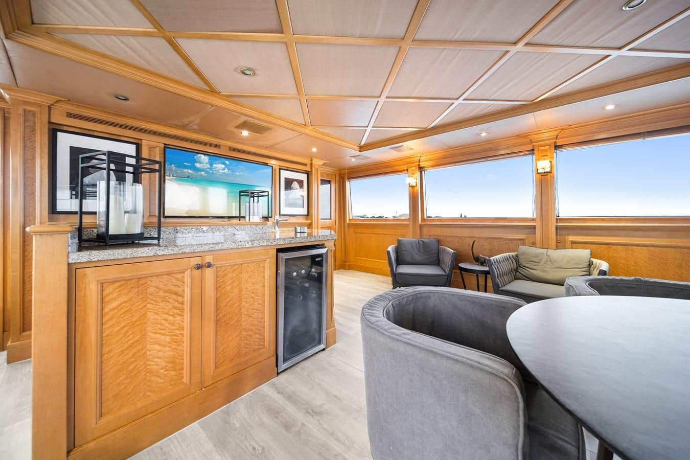a living room with a large tv aboard OCEAN DRIVE Yacht for Sale