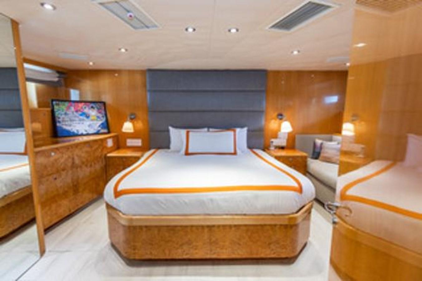 a bed in a hotel room aboard 2000 116 BAGLIETTO Yacht for Sale