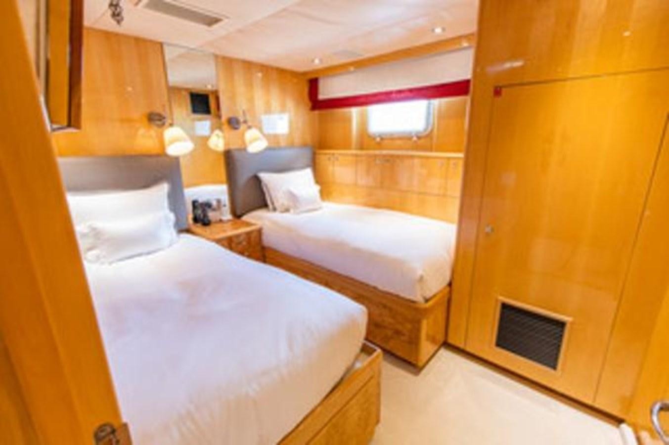 a room with two beds aboard 2000 116 BAGLIETTO Yacht for Sale