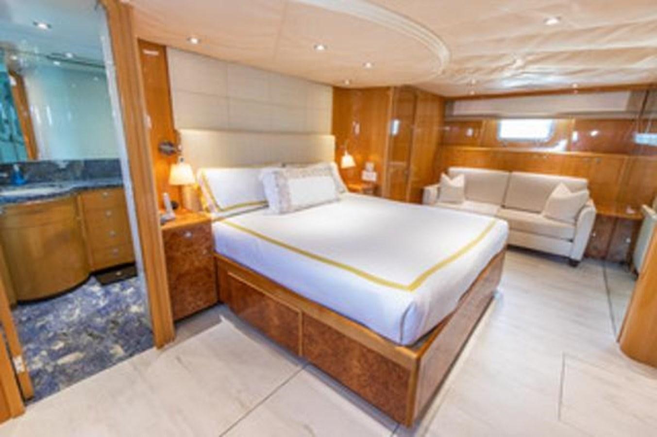 a large bedroom with a bed aboard 2000 116 BAGLIETTO Yacht for Sale