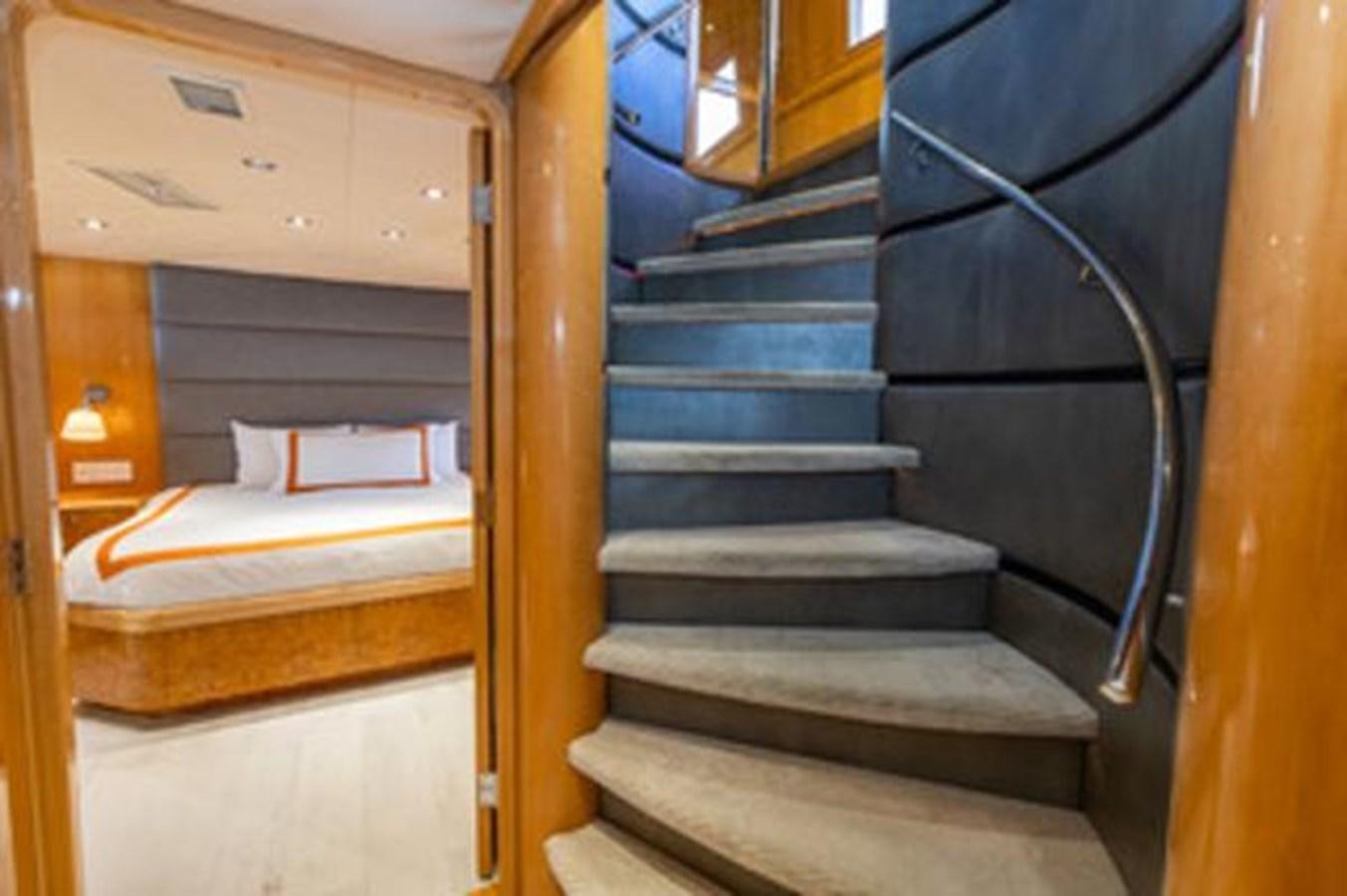 a set of stairs leading to a room aboard 2000 116 BAGLIETTO Yacht for Sale