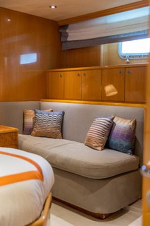 a couch in a room aboard 2000 116 BAGLIETTO Yacht for Sale