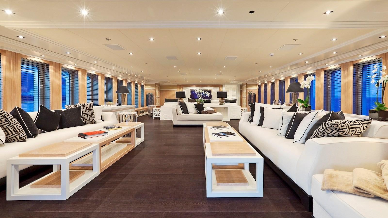 a living room with a couch and a table aboard BELLA 2 Yacht for Sale