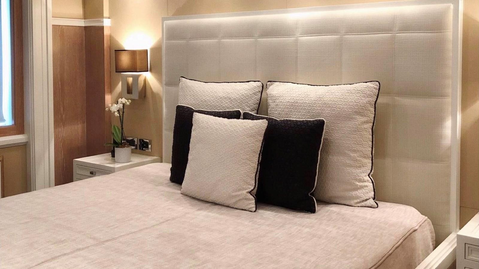 a bed with pillows aboard BELLA 2 Yacht for Sale