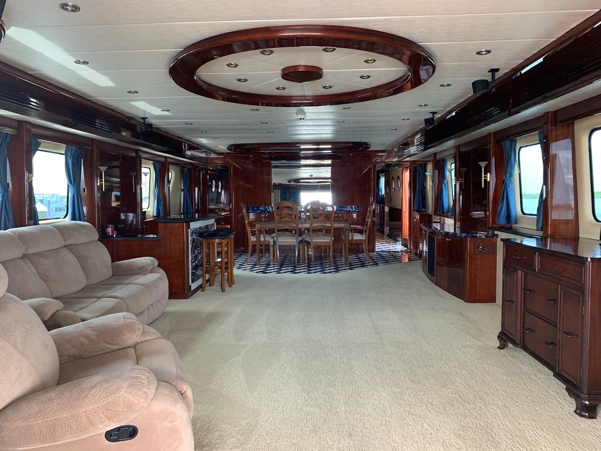 a room with a couch and a table and chairs aboard 117 BILGIN YACHTS 2007  Yacht for Sale